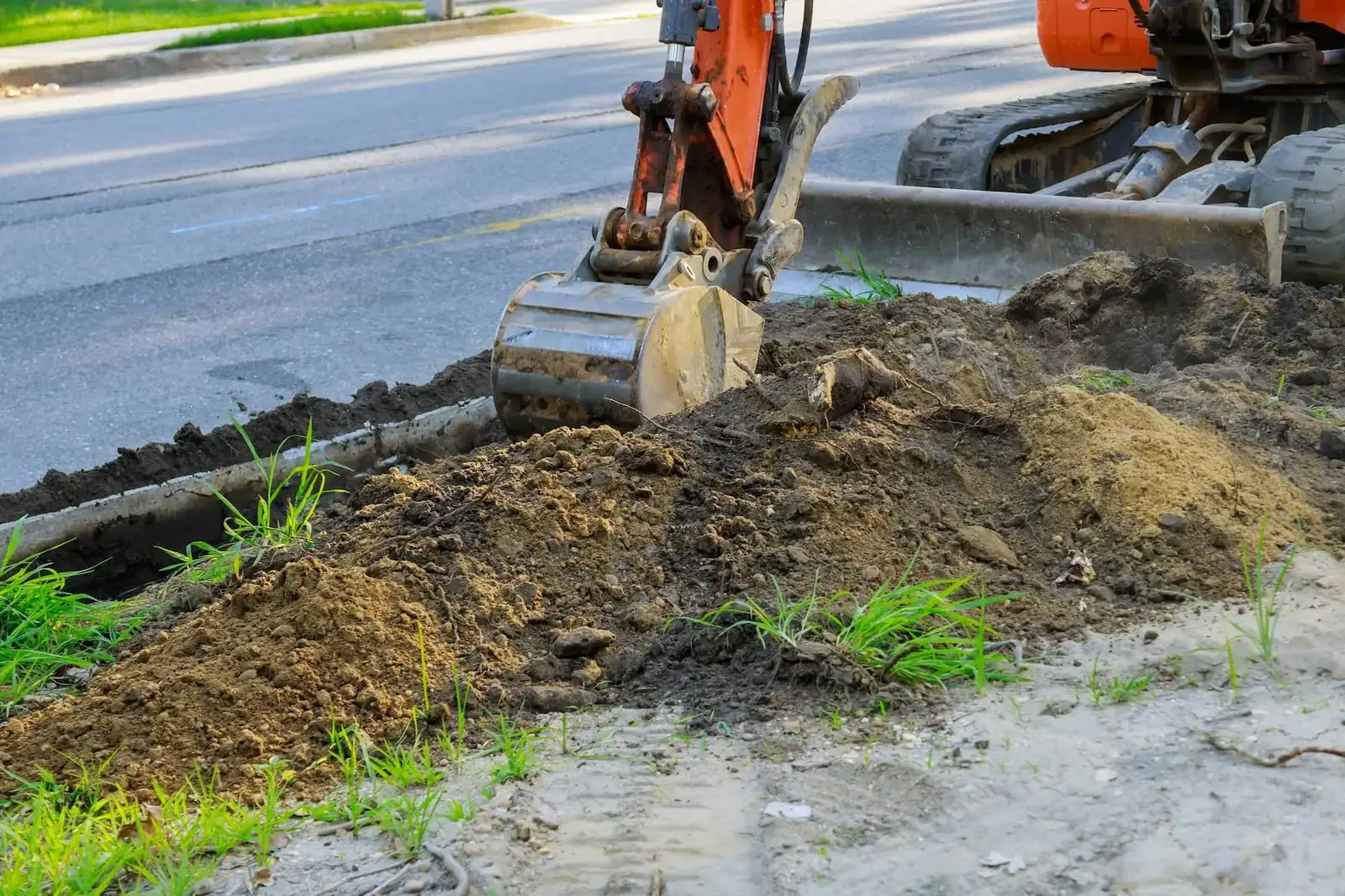 TDS Civil excavator working in an excavation pit on a Langley BC construction site